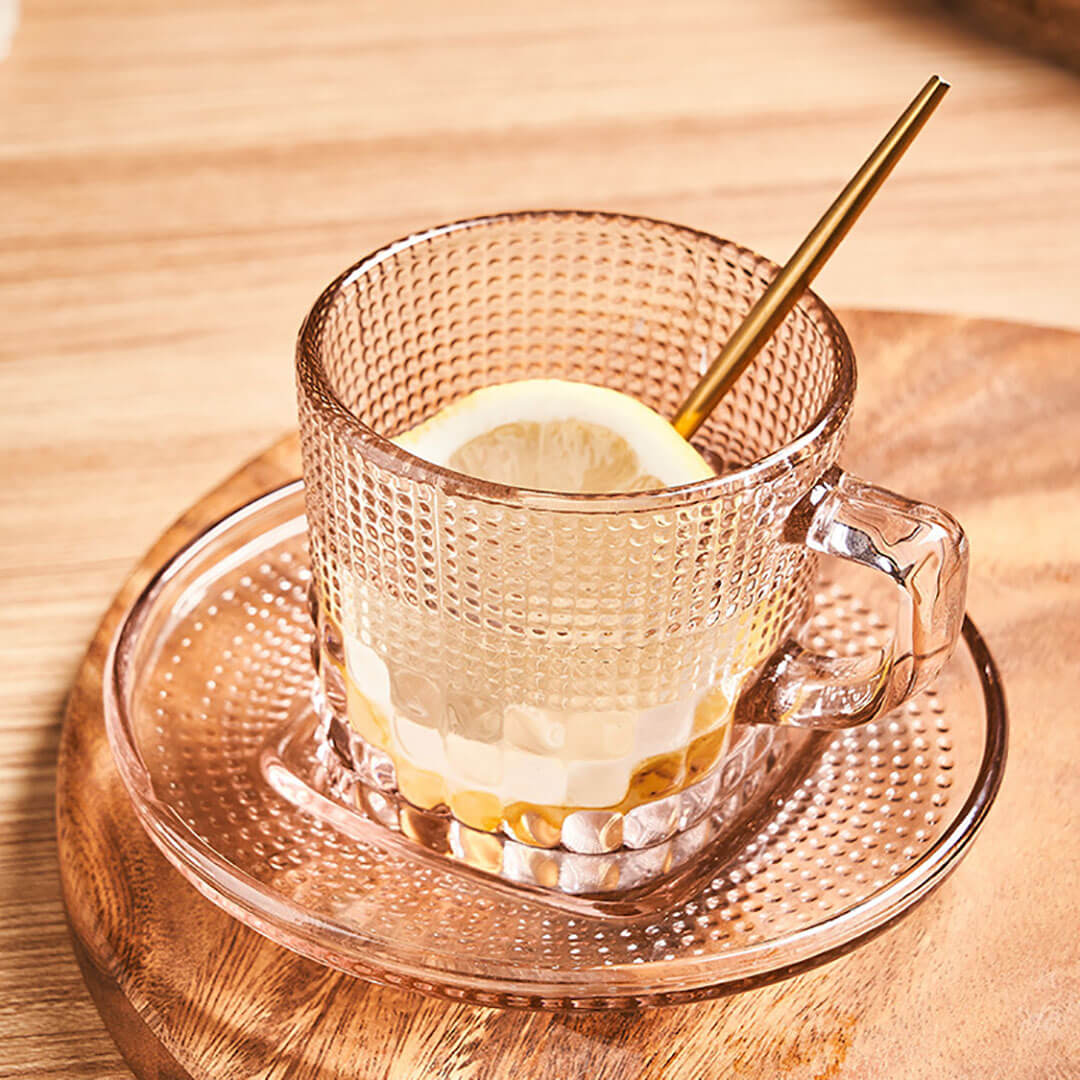 Juego de taza y platillo vintage de vidrio