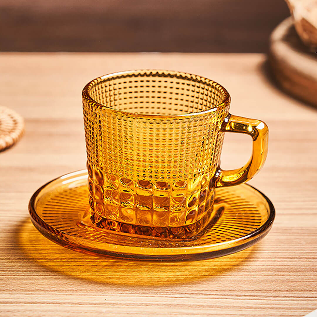 Juego de taza y platillo vintage de vidrio