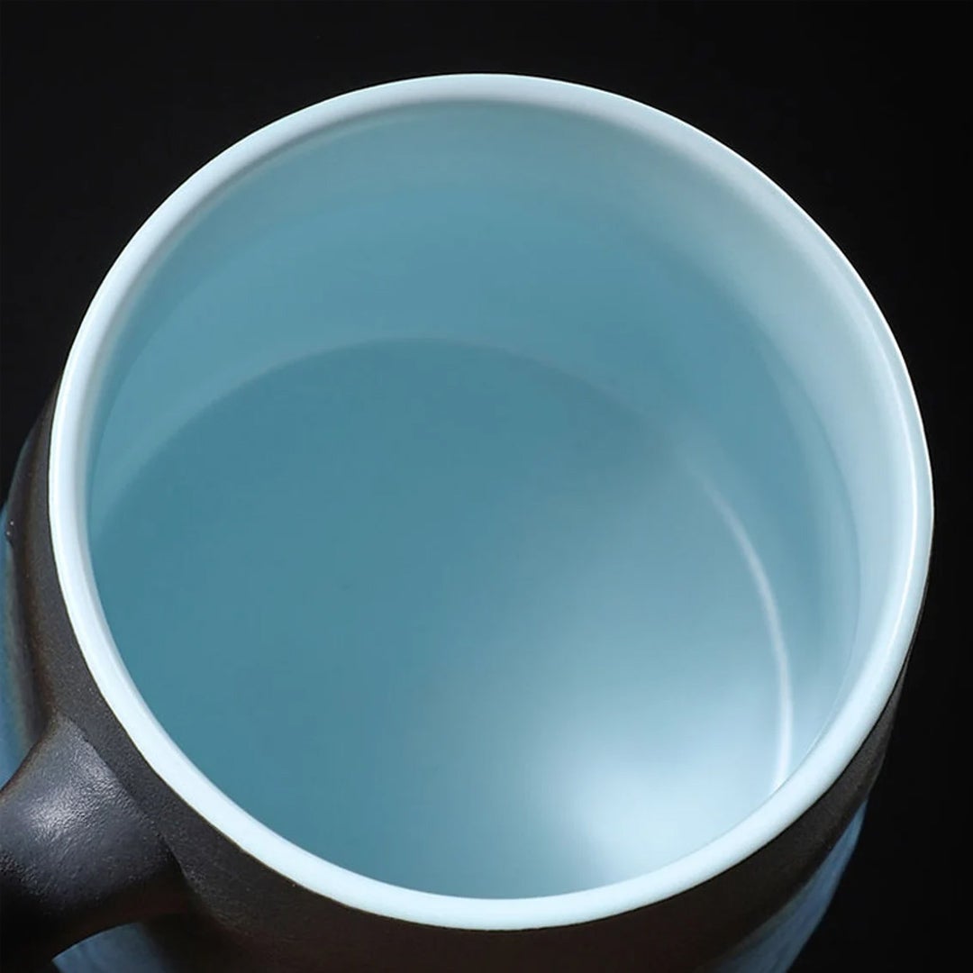 Taza de té de cerámica con infusor