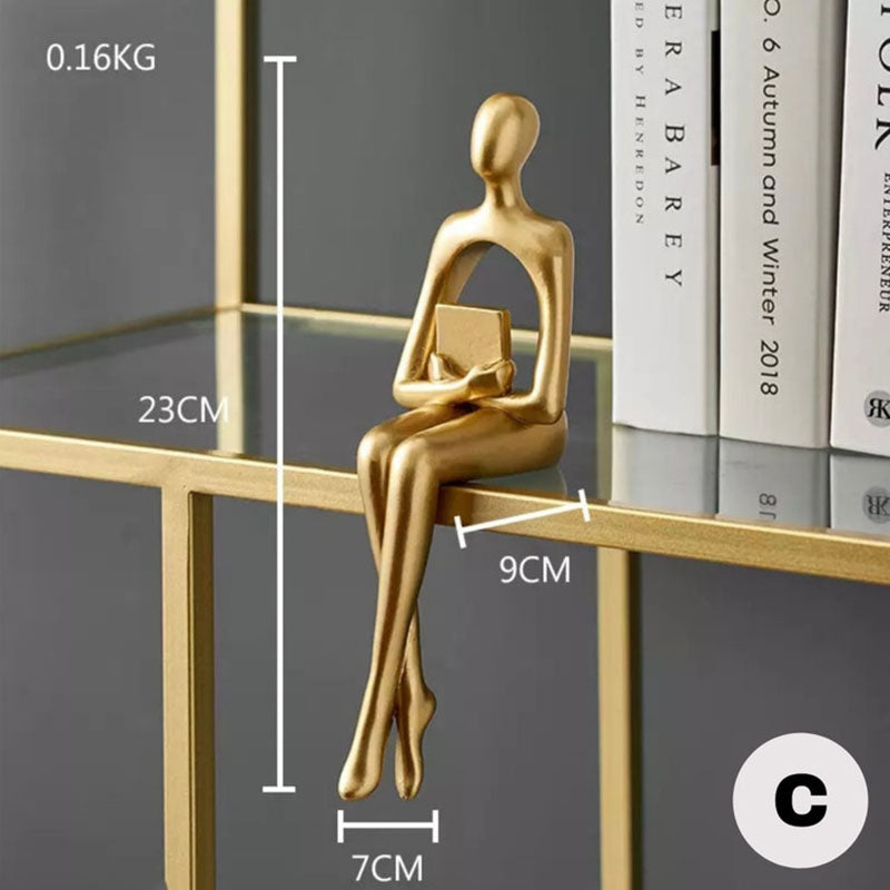 Figurine astratte della decorazione dello scaffale