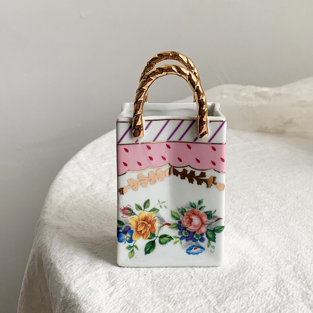 Florero retro con forma de bolsa pequeña