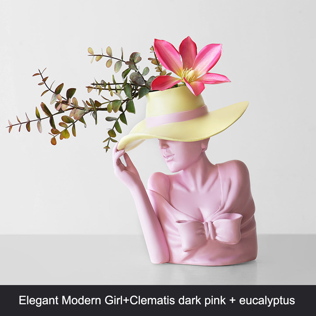 Vaso di fiori con statua di ragazza moderna