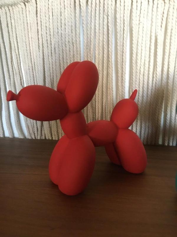 Escultura de perro globo