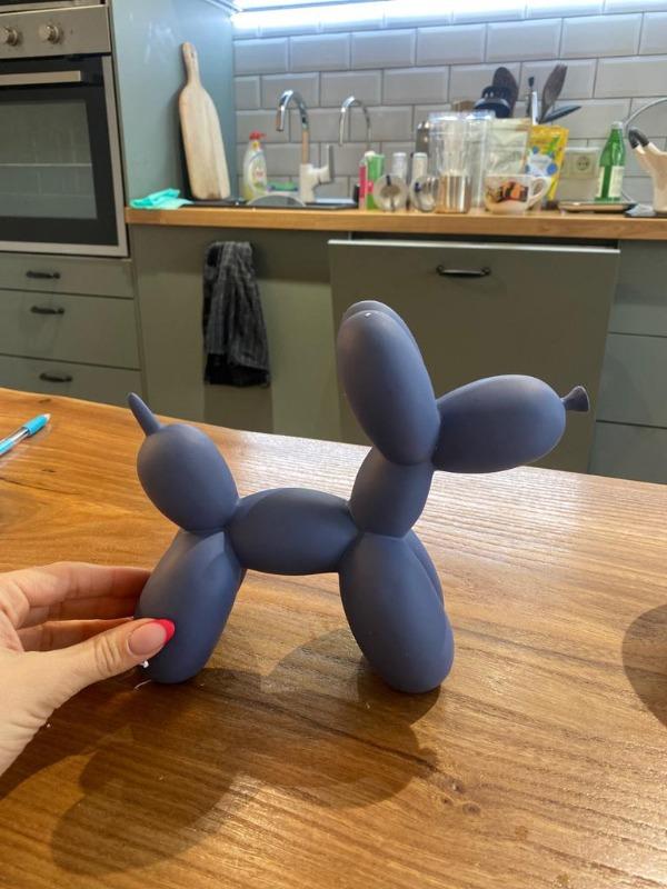 Escultura de perro globo