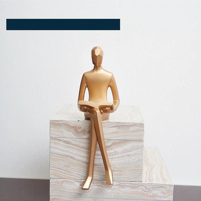 Golden Geometric Portrait Statue