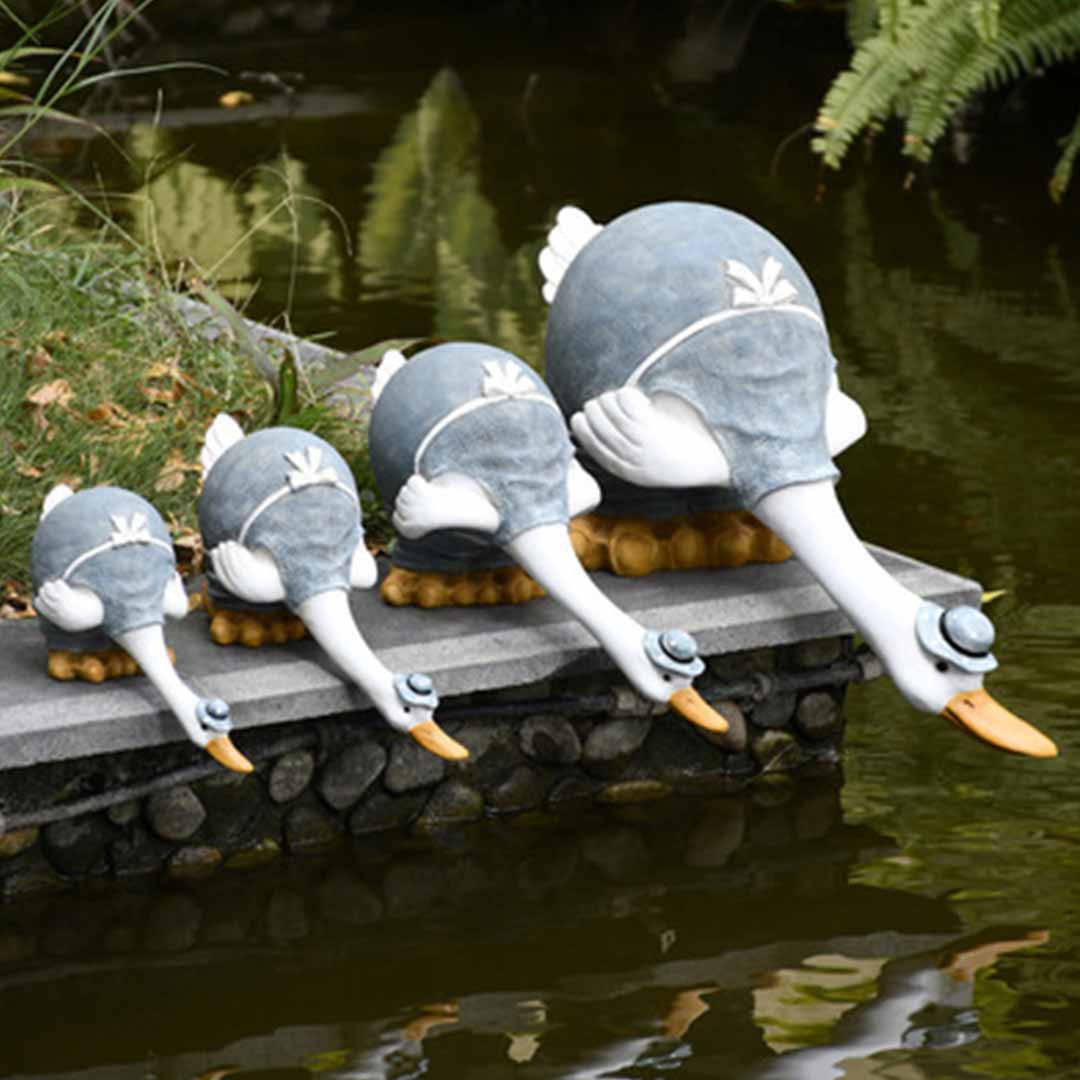 Estatua de pato de jardín