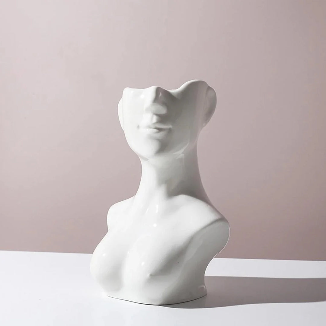 Vase aus Keramik mit menschlichem Gesicht