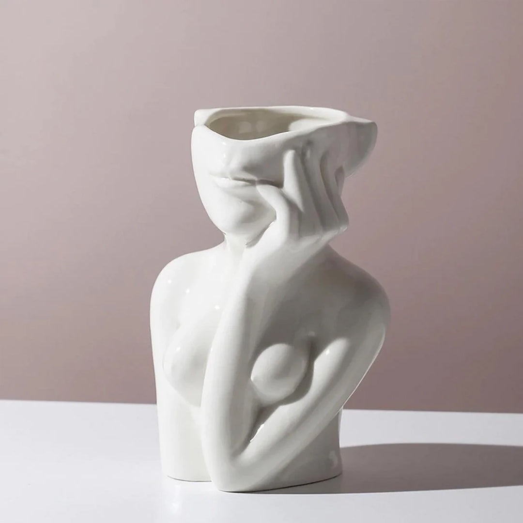 Vase aus Keramik mit menschlichem Gesicht