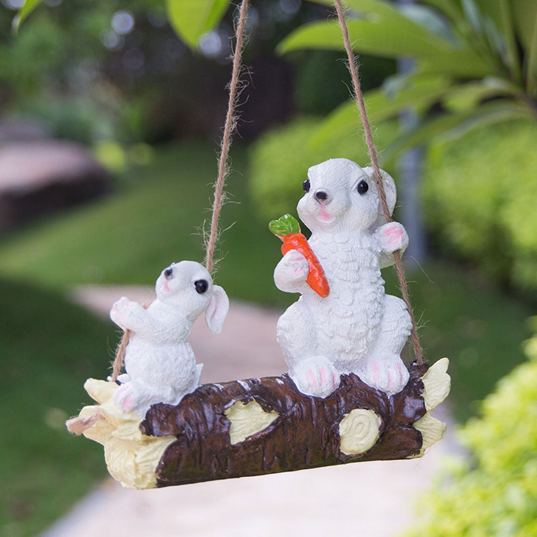 Figurita Bulldog Francés en Columpio