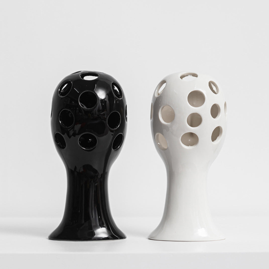 Vase aus Keramik mit menschlichem Gesicht