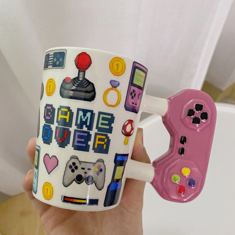 Tazza con manico per console di gioco creativa