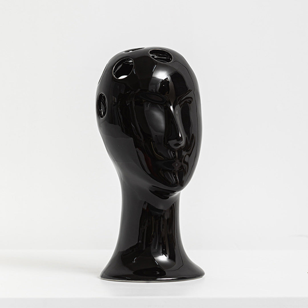 Vase visage humain en céramique
