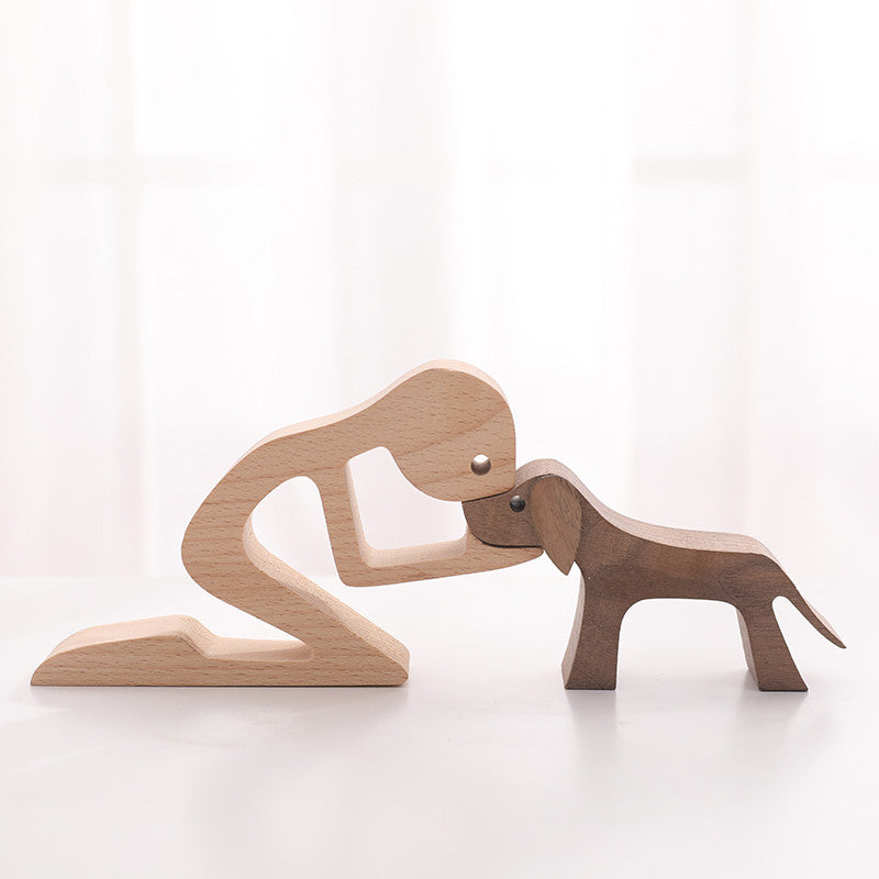 Adorno de madera humano y perro