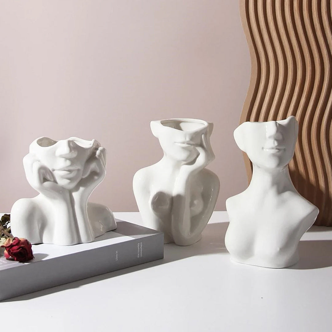 Vase aus Keramik mit menschlichem Gesicht