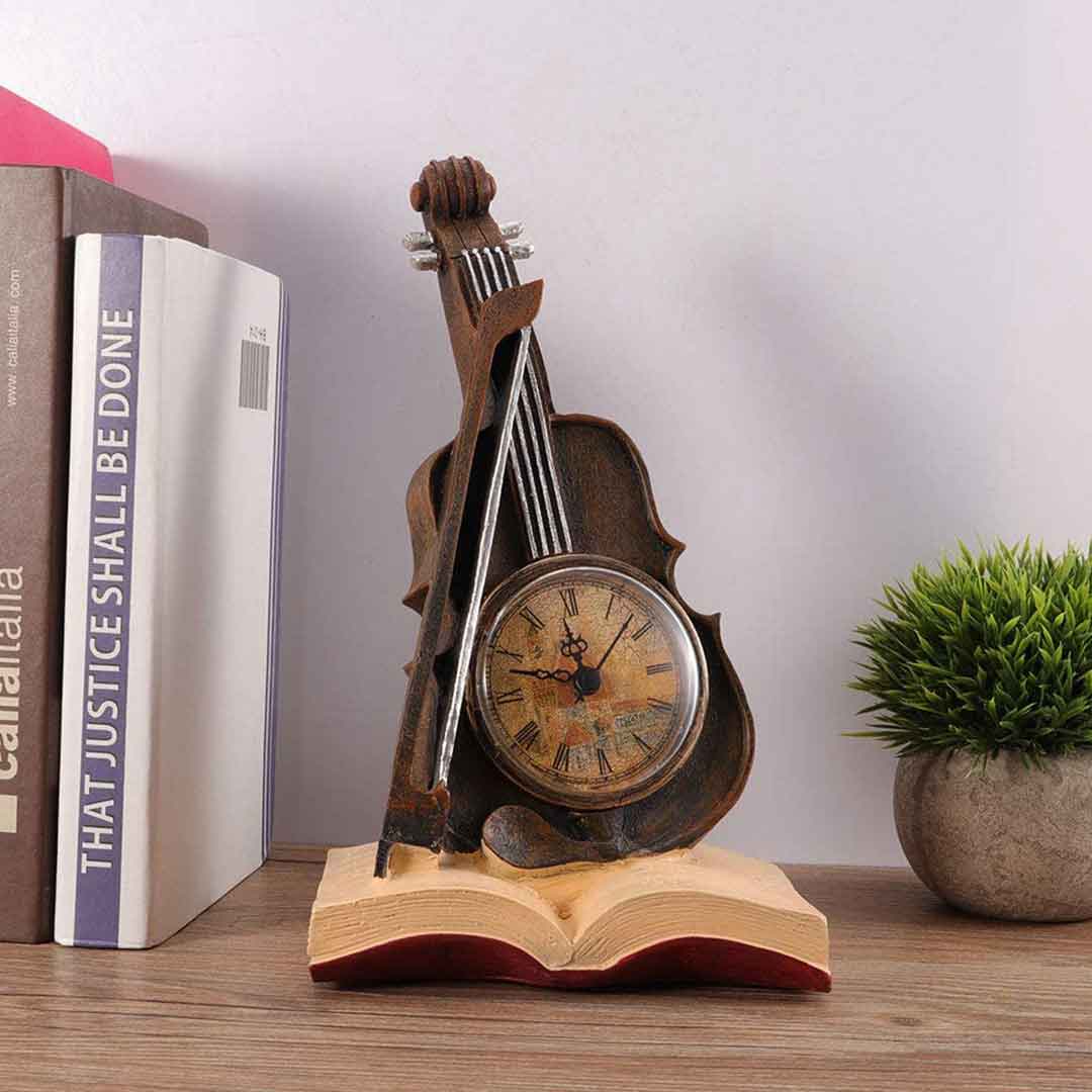 Reloj violín antiguo