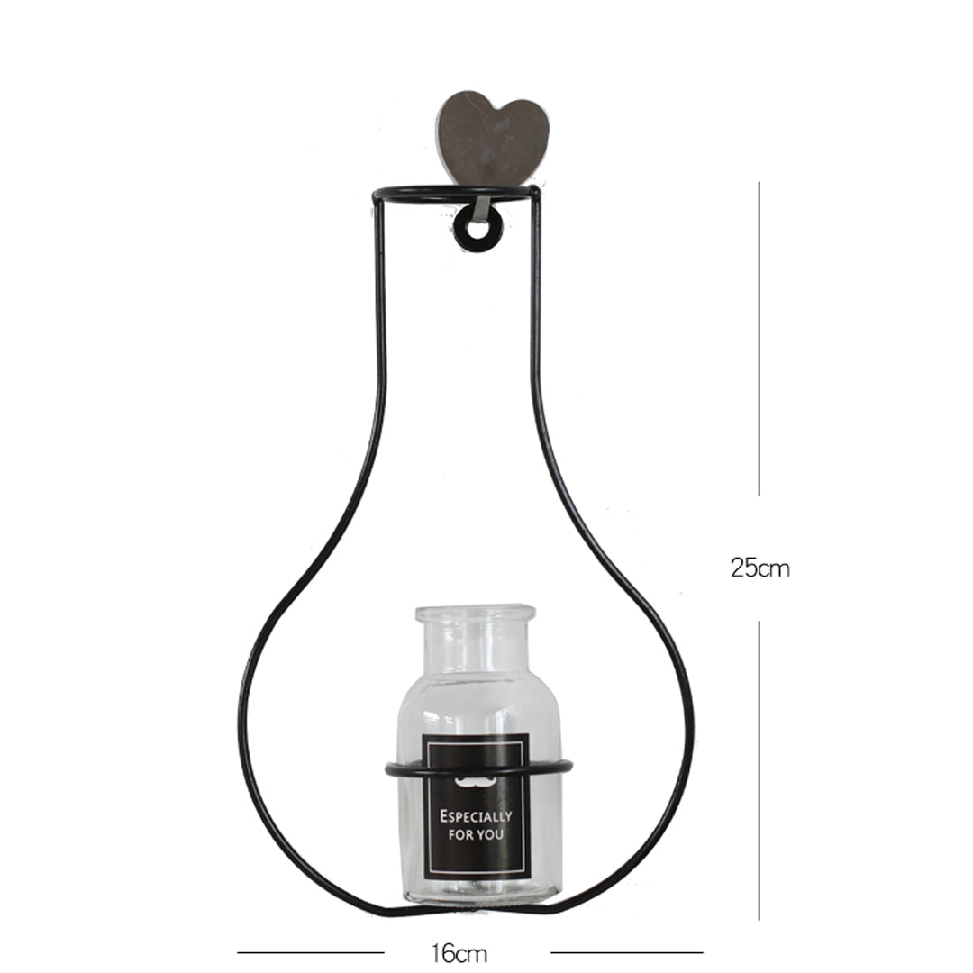 Vase aus Metall mit schwarzer Silhouette und Umriss