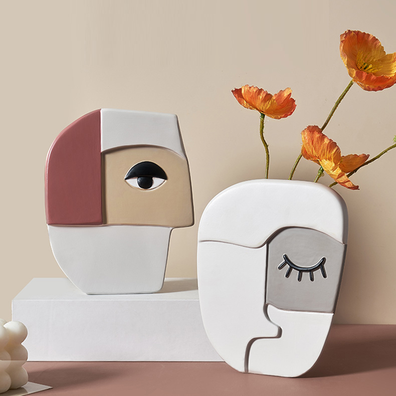 Vase visage humain abstrait