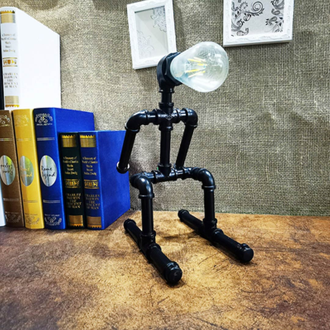 Lámpara de mesa Loft Creative Pipe Robot