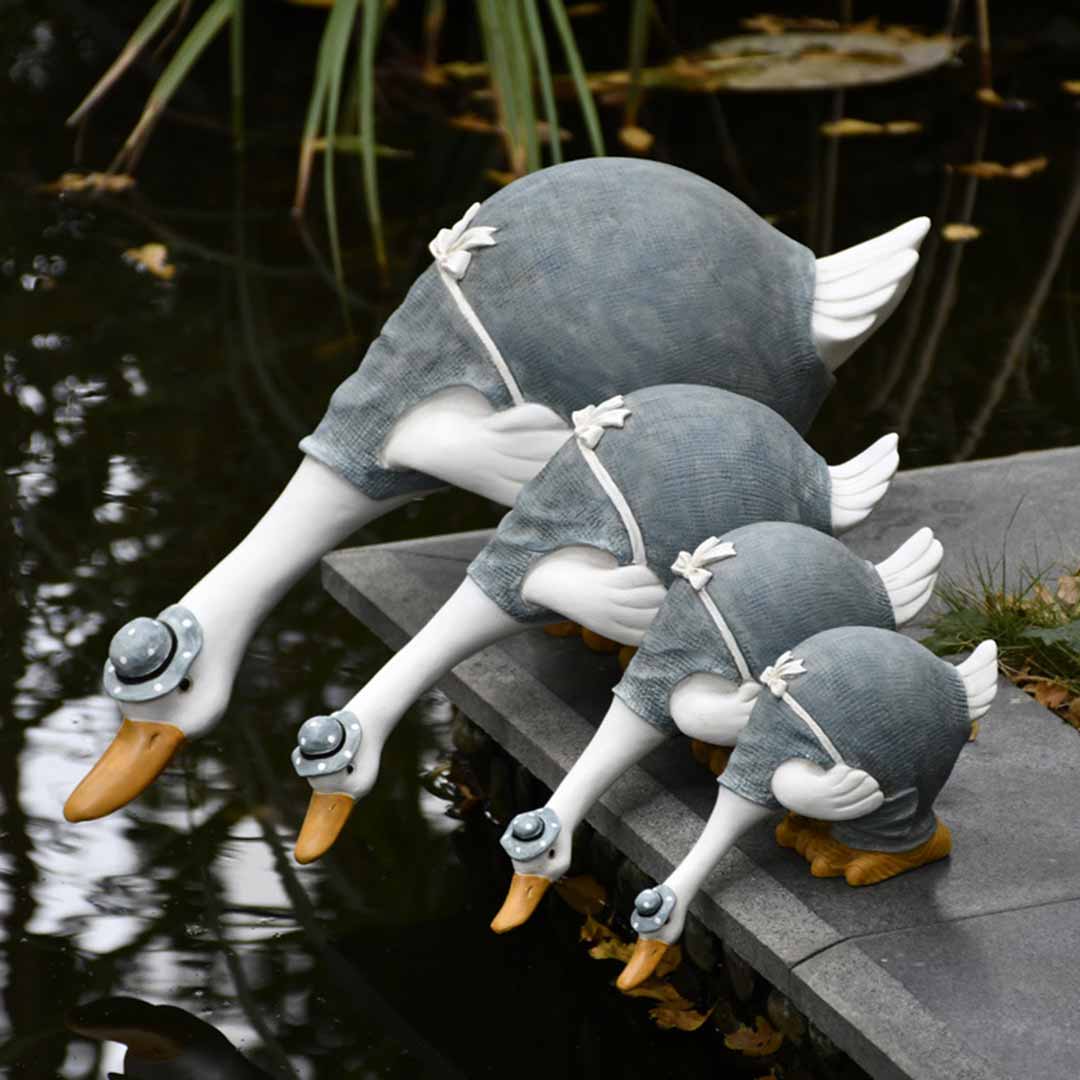 Estatua de pato de jardín