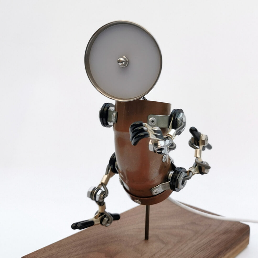 Lampada robot da atleta in esecuzione Steampunk