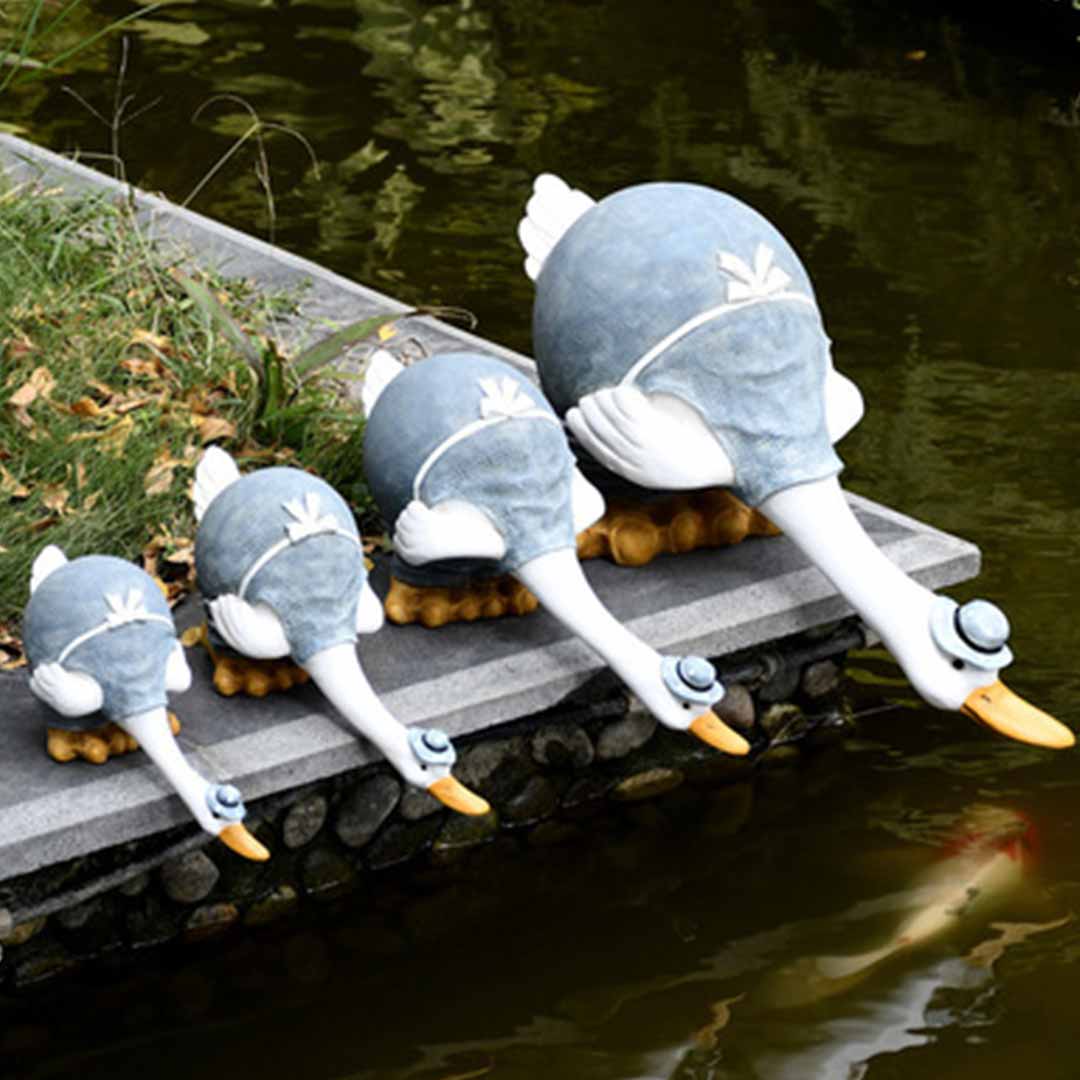 Estatua de pato de jardín