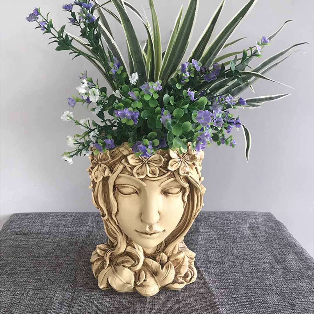 Pot de fleur de visage de fée