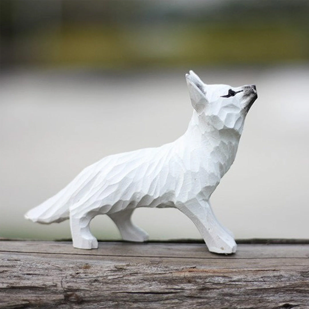 Figurines de renard en bois
