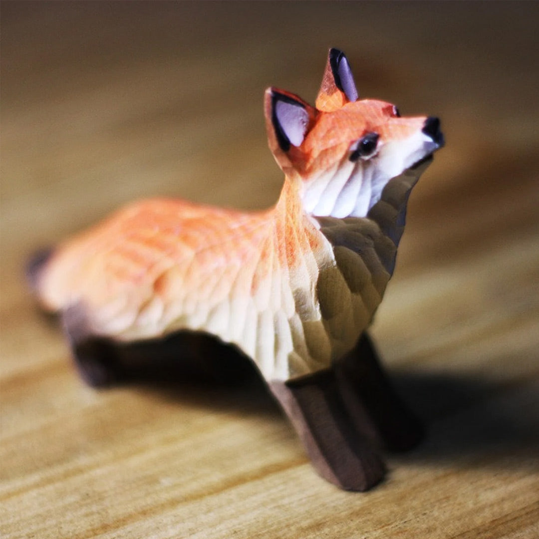 Figurines de renard en bois