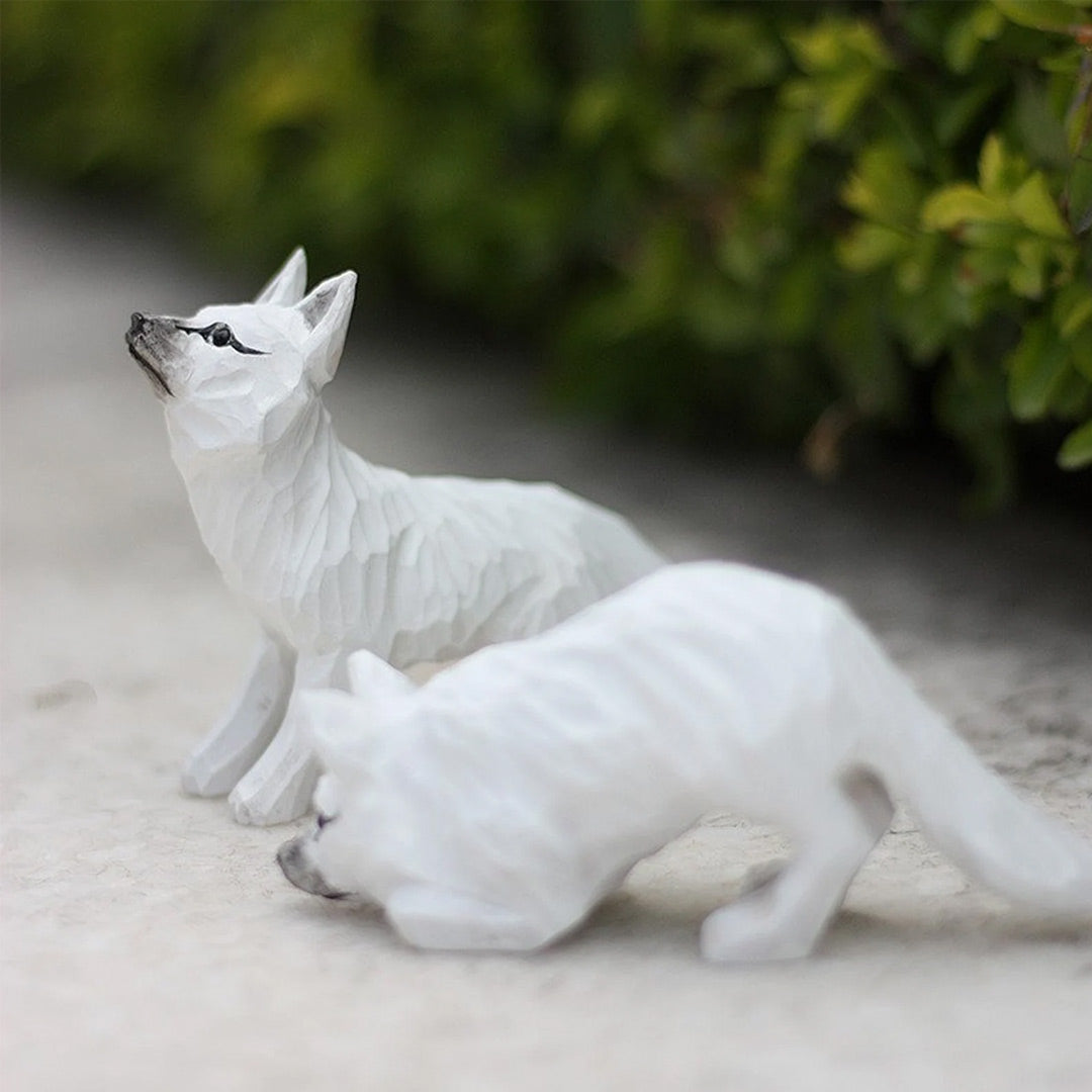 Figurines de renard en bois