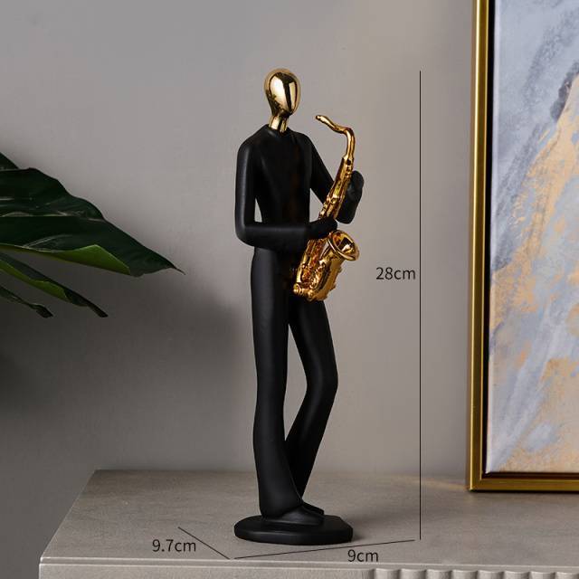 Statuina musicista dorata/nera