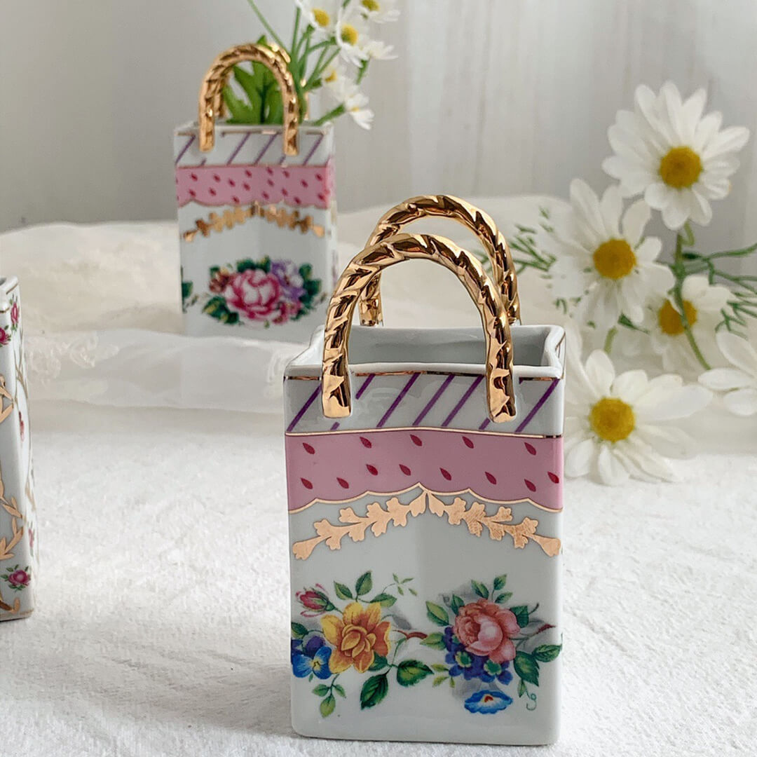 Vaso di fiori a forma di piccola borsa retrò