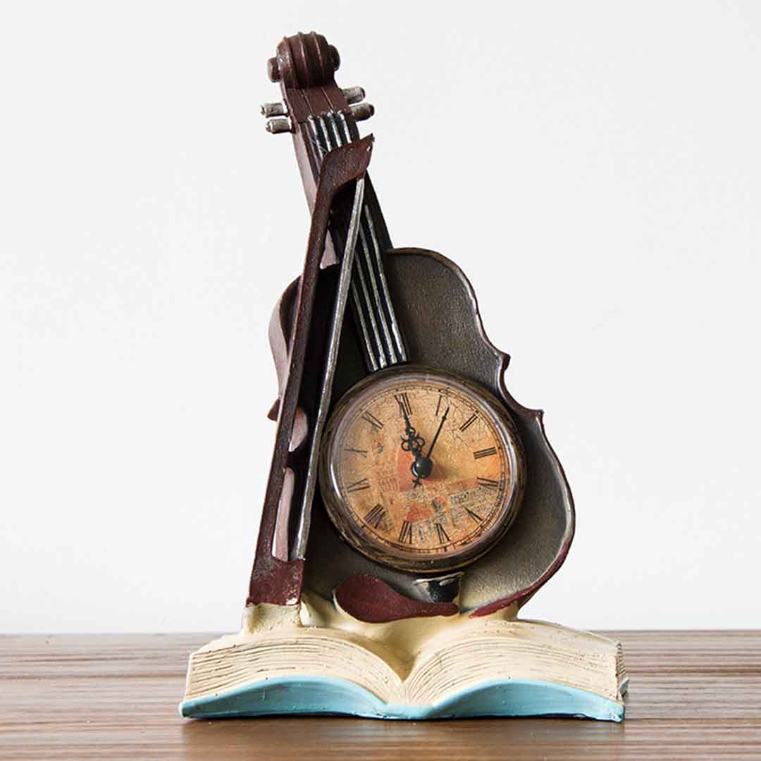 Reloj violín antiguo