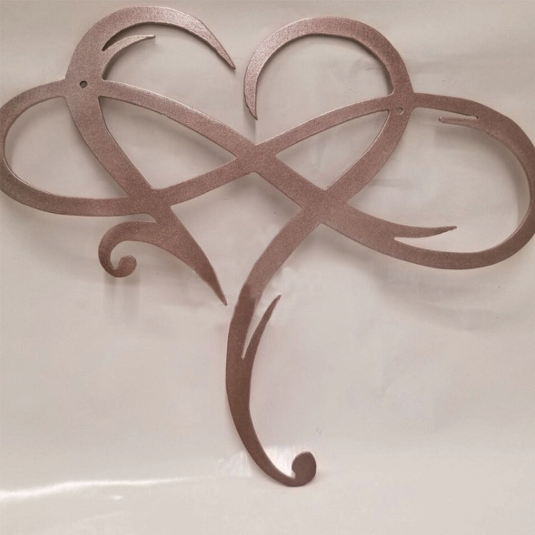 Decoración de pared de acero con corazón infinito
