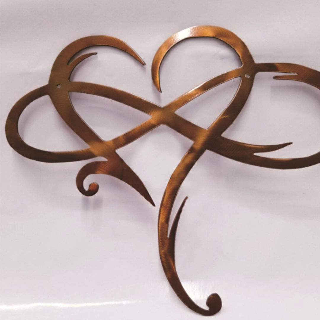 Decoración de pared de acero con corazón infinito