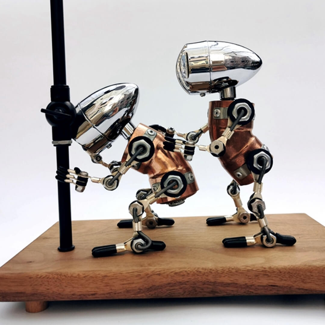 Lampada robot ubriaco in metallo