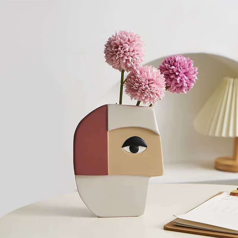 Vase visage humain abstrait