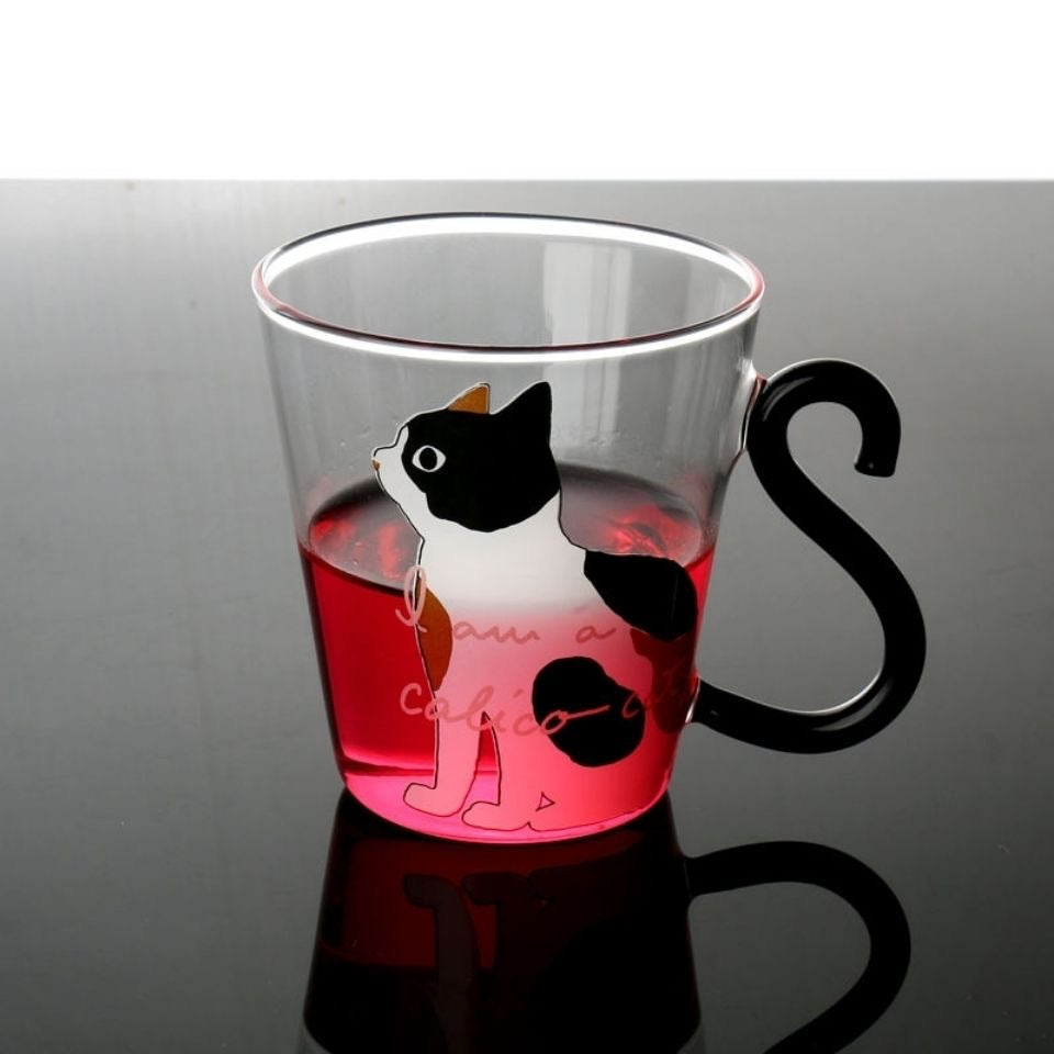 Taza de cristal con asa de cola de gato