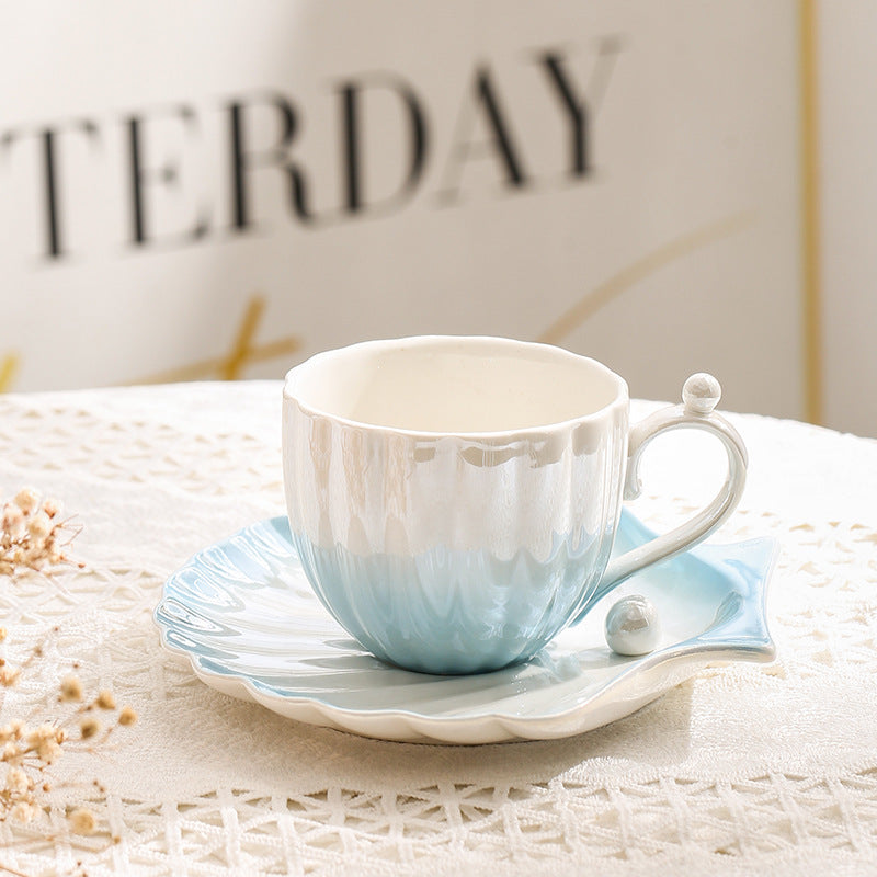 pearl shell tea cups and saucers, blue color