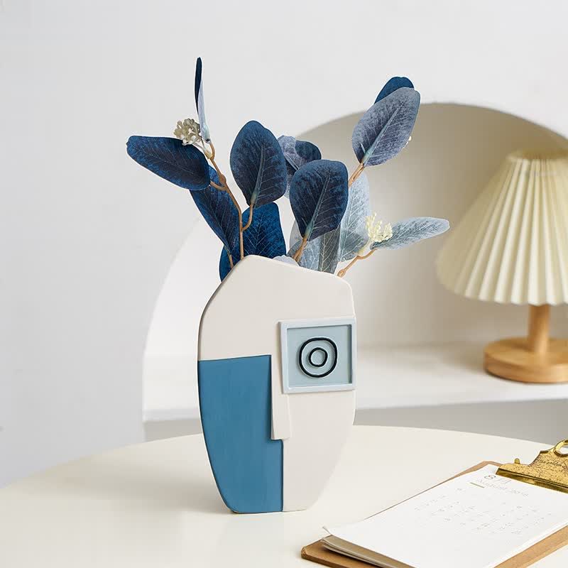 Vase visage humain abstrait