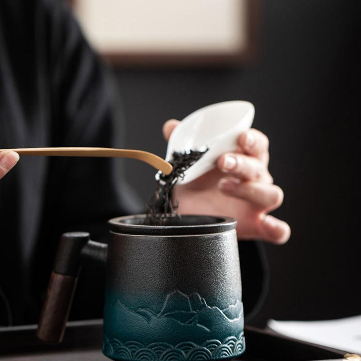 The japanese ceramic mug with lid wood handle and tea infuser