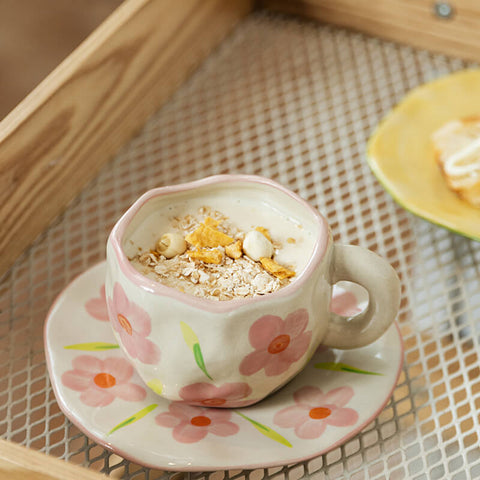 The ceramic floral mugs with saucer