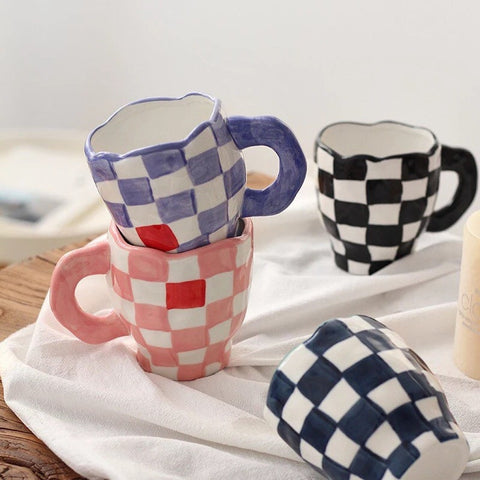 The ceramic checkered mugs