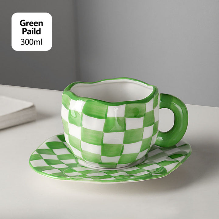 The ceramic checkered mugs, green white color
