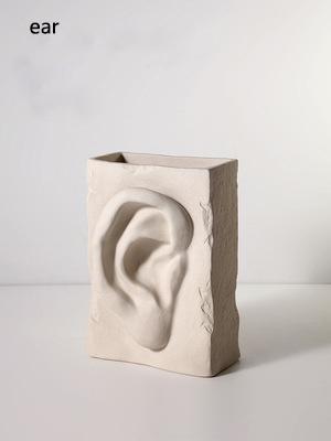 Vase en forme d'oreille de bouche d'oeil