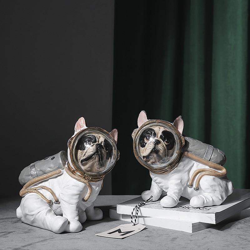 Figurine di cani astronauti