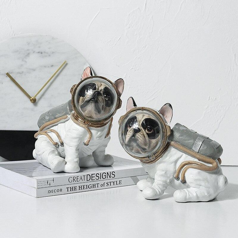 Figurine di cani astronauti