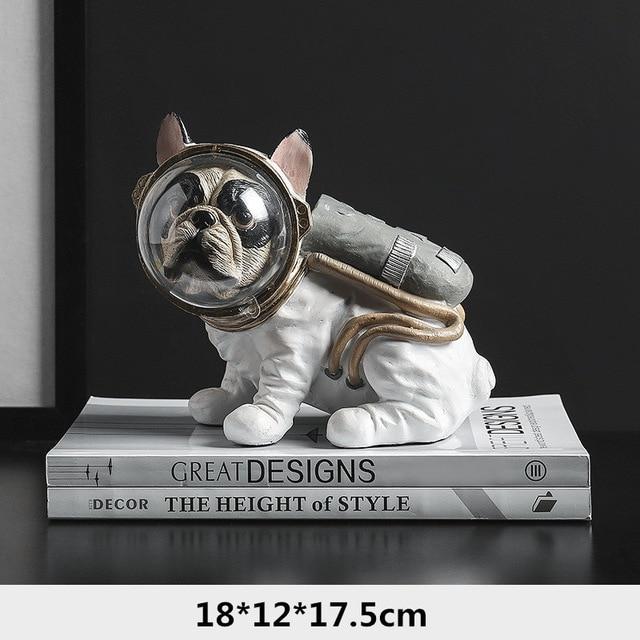 Figurine di cani astronauti