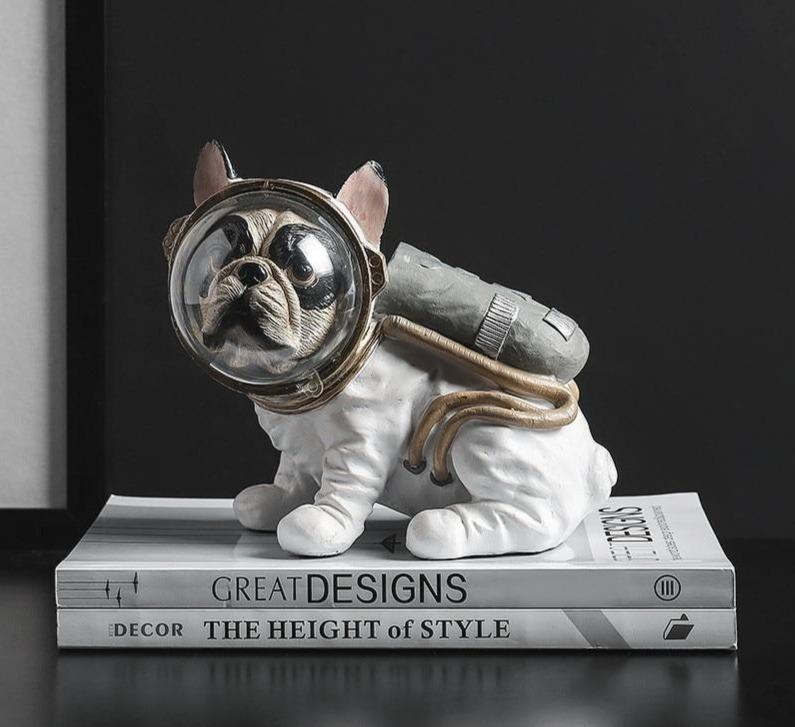 Figurine di cani astronauti