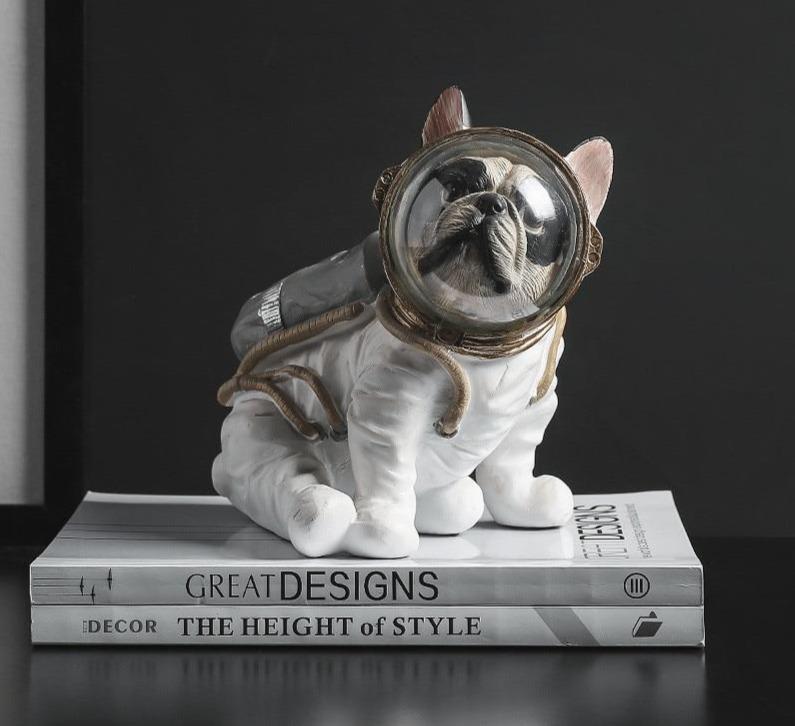 Figurine di cani astronauti