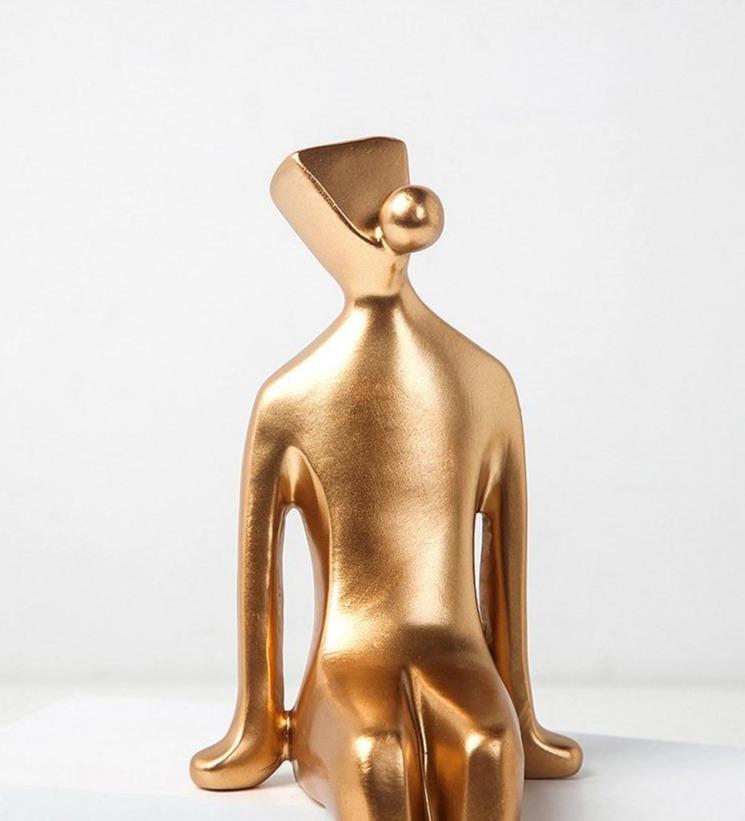 Abstract Golden Human Sitting